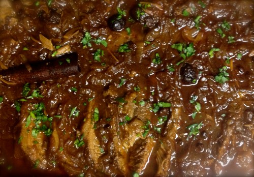 Brisket sliced and coated with sauce Brisket sliced and coated with sauce