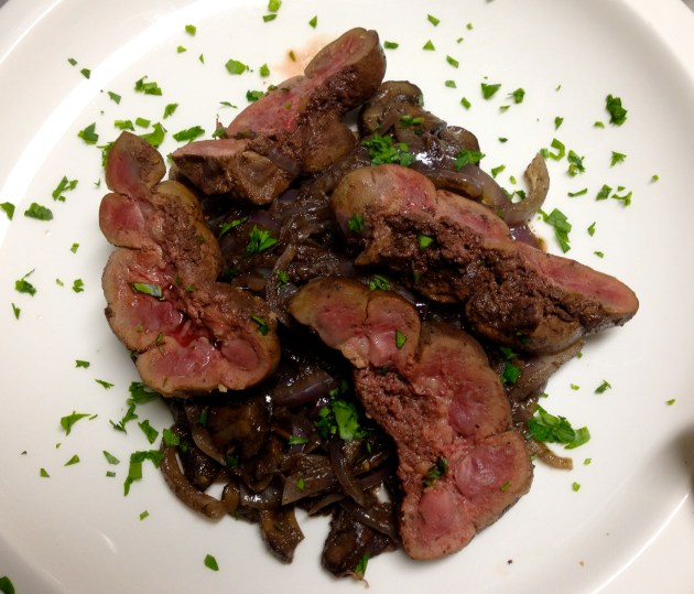 Lamb kidneys on a bed of sauteed onions and mushrooms Lamb kidneys on a bed of sauteed onions and mushrooms