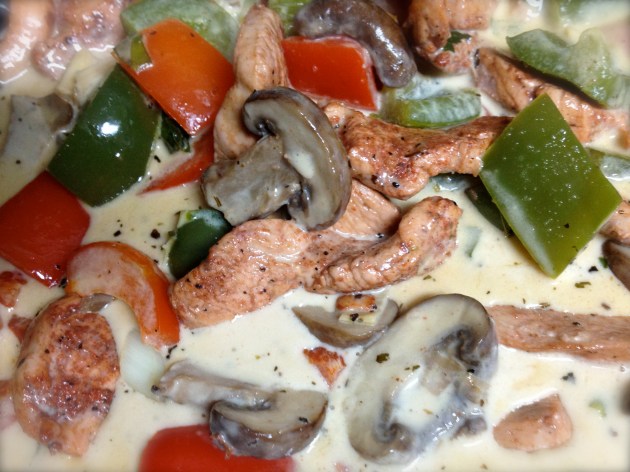 Cajun style chicken is ready to serve. Sauce is pink