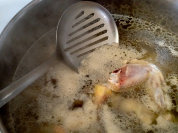 Removing the gray scum as it starts forming on the surface