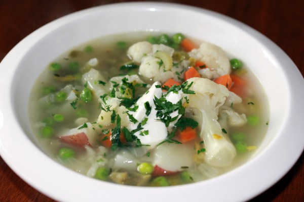Beautiful soup, with cauliflower and fresh sugar snap peas