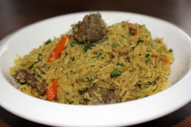 Lamb plov served in a bowl on a regular Friday night. Nothing fancy