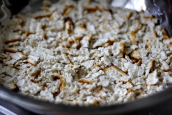 Crumbled Matzoh soaked in warm water