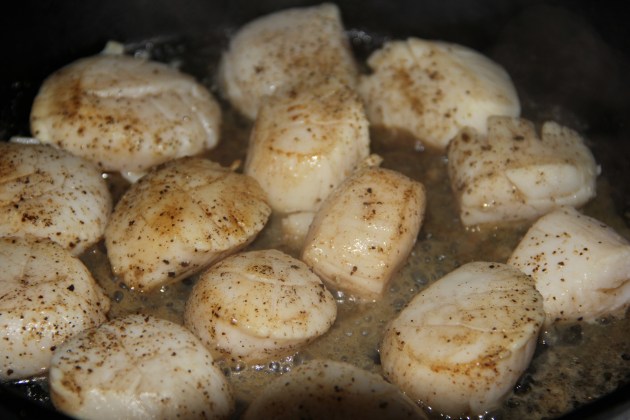 Sauteing scallops in butter. Sounds very not Greek to me