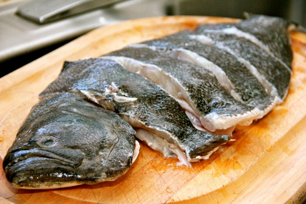 Medium large flounder, cleaned, fins removed, and sliced Medium large flounder, cleaned, fins removed, and sliced