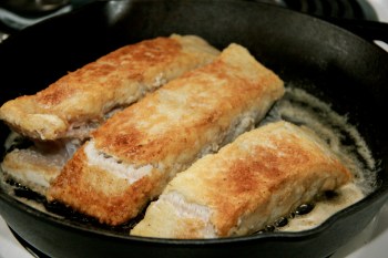 Browning the slices of flounder