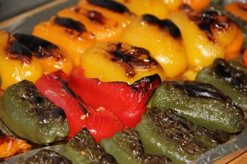 Just out of the oven, blistered, charred but not overcooked - roasted peppers