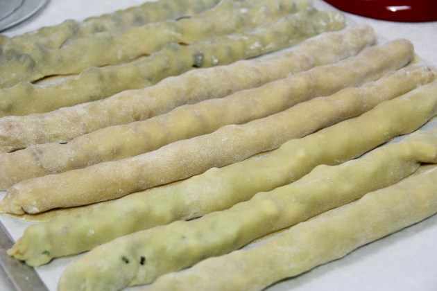 Rolled up fruit pipes ready to bake