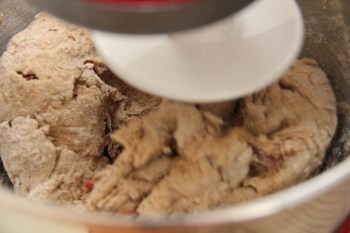 Kneading the dough for rye baguette with bacon