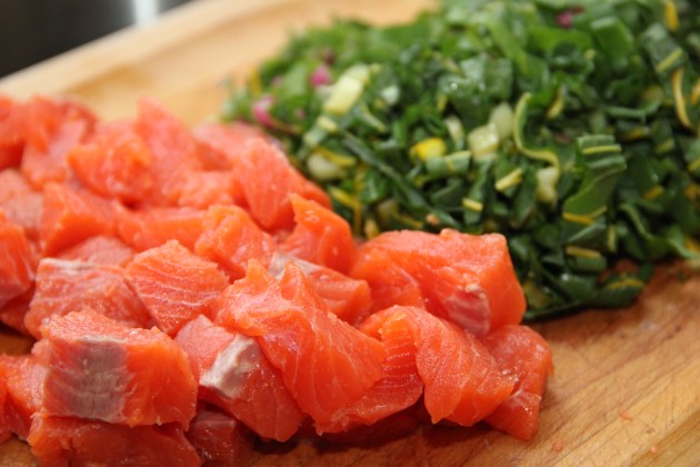 Beautiful cubed Coho salmon and shredded chard leaves Beautiful cubed Coho salmon and shredded chard leaves