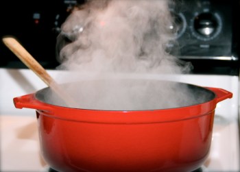 Steam rising over the Dutch oven