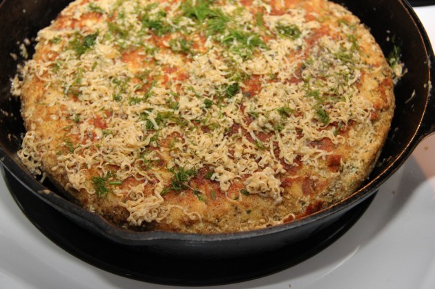 Making Fish Roe Skillet Pie -- melting the cheese