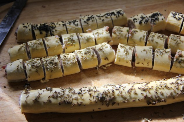 Sausage Bites With Pine Nuts -- cutting the stuffed dough