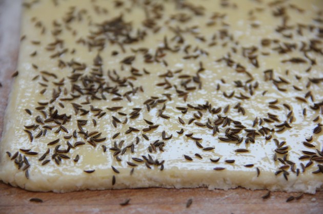 Cheese Sticks With Caraway Seed -- eggwashing and sprinkling the seeds
