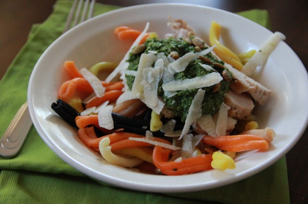 Putting together Spinach & Pumpkin Seed Pesto Pasta Bowl